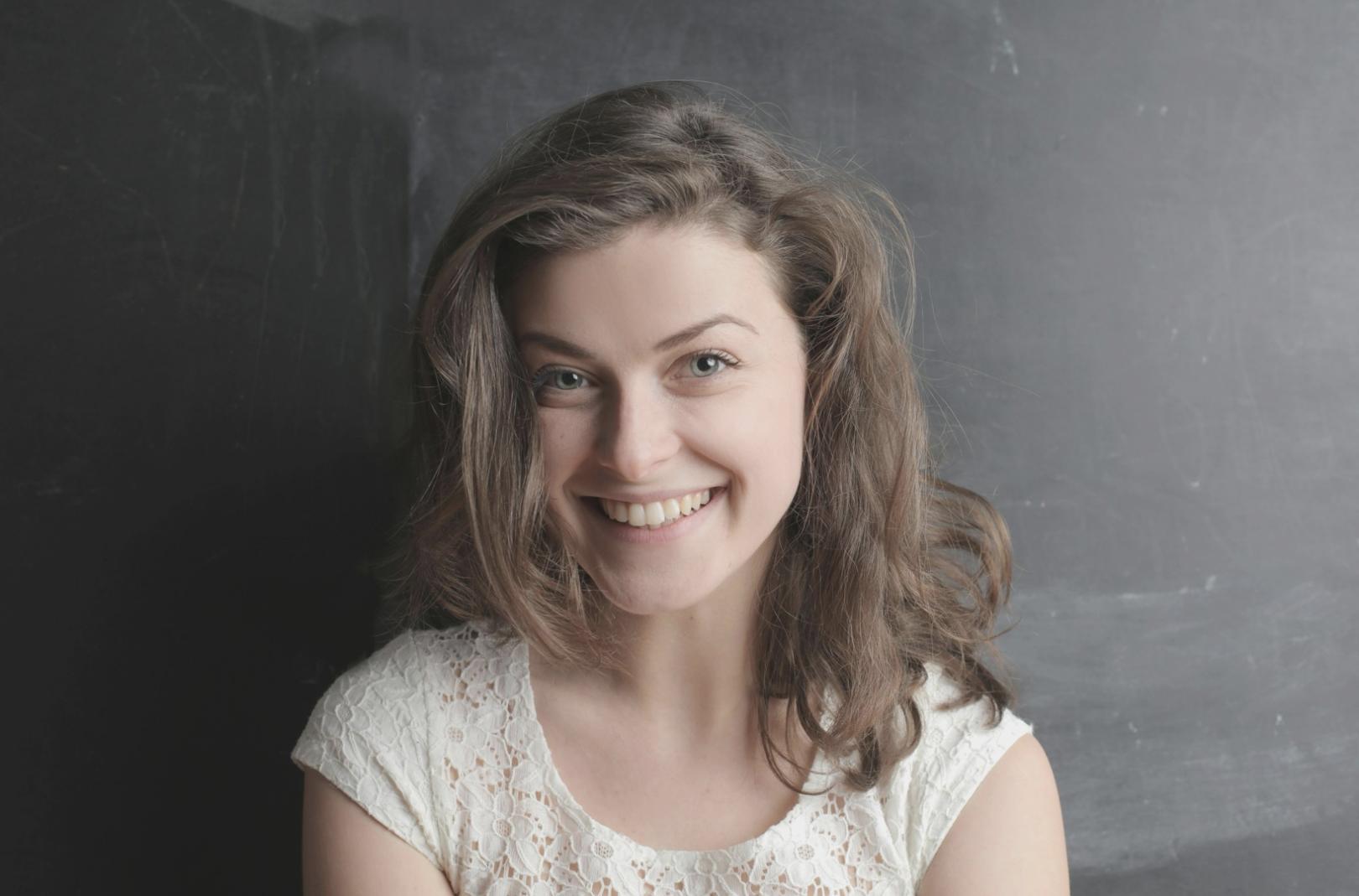 Student practicing barbering technique during seminar